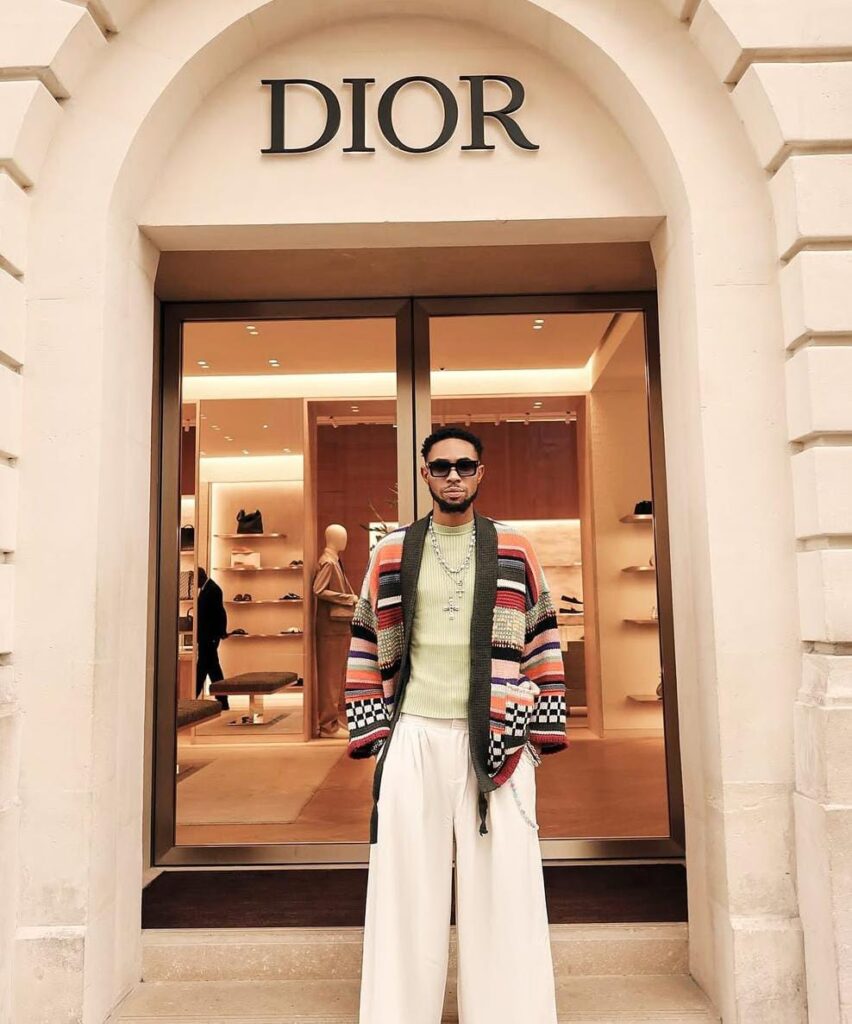 Crispdal Biography, Age, Girlfriend, Net Worth & Source of Wealth 1 crispdal in frony of a dior shop